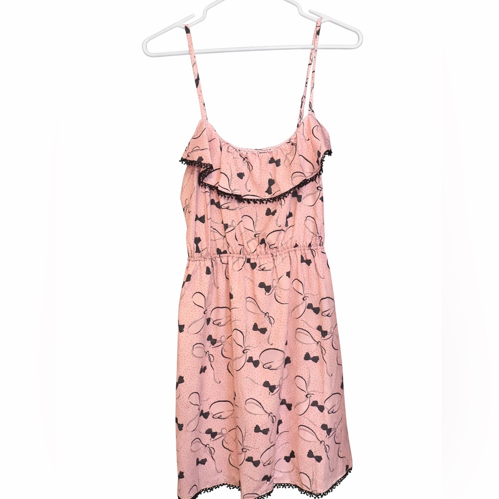 Anthropologie Pink Slip with Bow Pattern